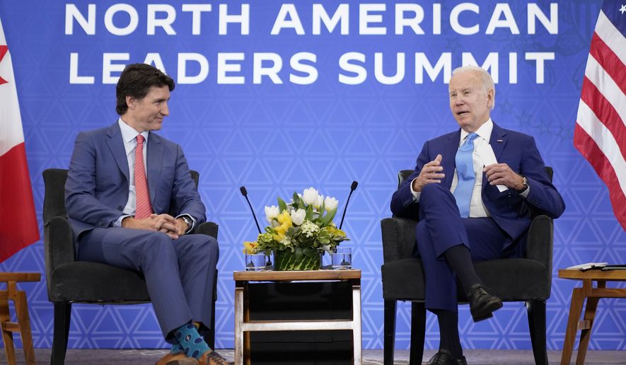 President Joe Biden speaks as he meets with Canadian Prime Minister Justin Trudeau at the InterContinental Presidente Mexico City hotel in Mexico City, Jan. 10, 2023. Biden will visit Canada for the first time since taking office, the White House announced Thursday, March 9. The one-night trip will take place on March 23 and 24. (AP Photo/Andrew Harnik) **FILE**