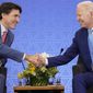 President Joe Biden meets with Canadian Prime Minister Justin Trudeau at the InterContinental Presidente Mexico City hotel in Mexico City, Jan. 10, 2023. Biden will visit Canada for the first time since taking office, the White House announced Thursday, March 9. The one-night trip will take place on March 23 and 24. (AP Photo/Andrew Harnik, File)