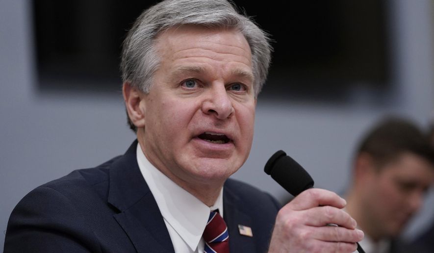 FBI Director Christopher Wray testifies during the House Select Committee on Intelligence annual open hearing on world widethreats at the Capitol in Washington, Thursday, March 9, 2023. (AP Photo/Carolyn Kaster)