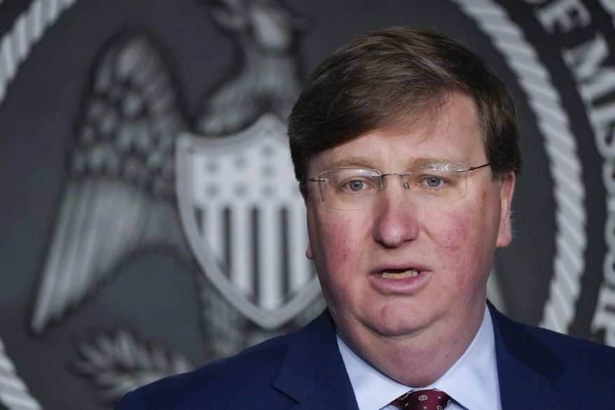 Mississippi Republican Gov. Tate Reeves speaks during a news conference, Tuesday, Feb. 28, 2023, in Jackson, Miss. Mississippi on Tuesday became the latest state to require Medicaid to provide a full year of coverage for low-income mothers after giving birth. Days earlier, he declared the policy was part of the state’s “new pro-life agenda.” (AP Photo/Rogelio V. Solis, File)
