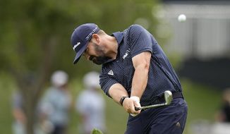 Chad Ramey hits from the 15th fairway during the first round of the Players Championship golf tournament Thursday, March 9, 2023, in Ponte Vedra Beach, Fla. (AP Photo/Eric Gay)