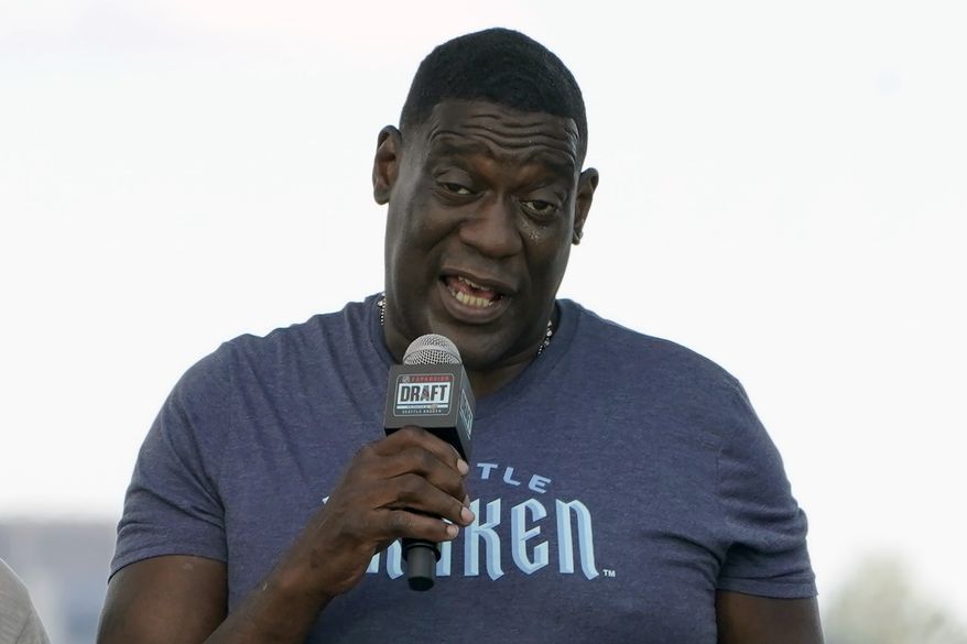 Former NBA basketball player Shawn Kemp speaks during the Seattle Kraken's NHL hockey expansion draft event in Seattle, July 21, 2021. Shawn Kemp was arrested and charged in connection with a drive-by shooting in Tacoma, Washington, and was set to be appear in court Thursday, March 9, 2023, a sheriff's official said. Online jail records show Kemp was booked on a felony charge of drive-by shooting shortly before 6 p.m. Wednesday. (AP Photo/Ted S. Warren) **FILE**