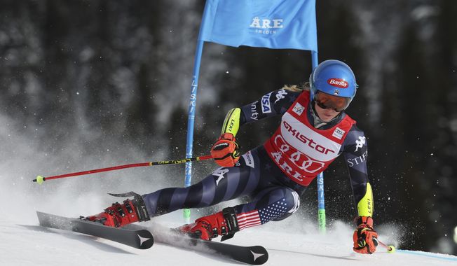 United States&#x27; Mikaela Shiffrin speeds down the course during an alpine ski, women&#x27;s World Cup giant slalom race, in Are, Sweden, Friday, March 10, 2023. (AP Photo/Alessandro Trovati)