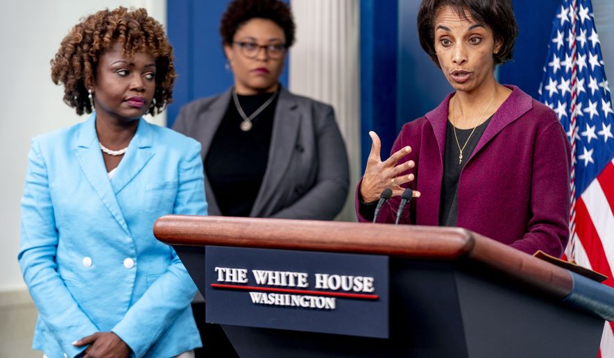 Council of Economic Advisers Chair Cecilia Rouse, right, accompanied by White House press secretary Karine Jean-Pierre, left, and Office of Management and Budget Director Shalanda Young, center, speaks at a press briefing at the White House in Washington, Friday, March 10, 2023. (AP Photo/Andrew Harnik)