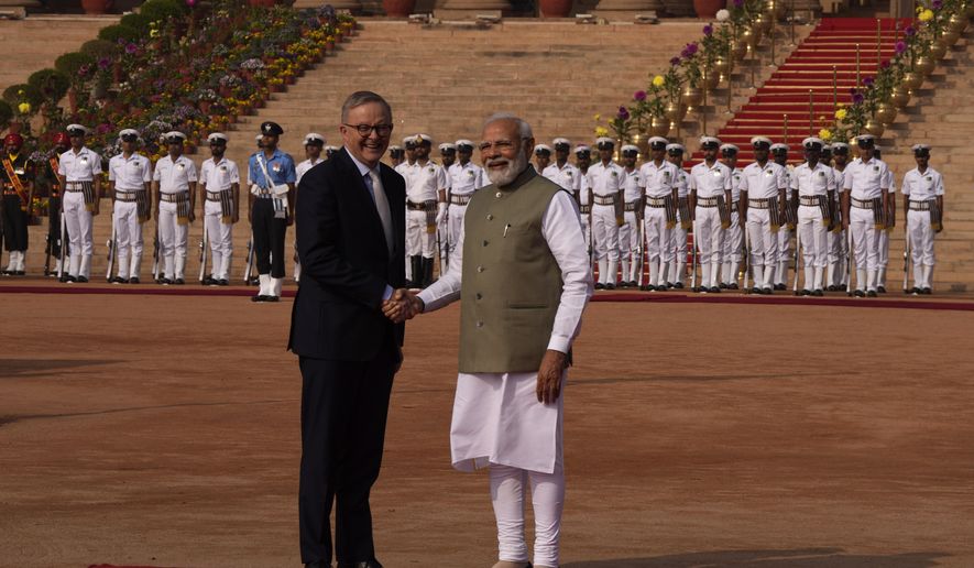 Indian Prime Minister Narendra Modi welcomes his Australian counterpart Anthony Albanese during laters&#x27;s ceremonial reception at the Indian presidential palace, in New Delhi, India, Friday, March 10, 2023. Australia is striving to strengthen security cooperation with India and also deepen economic and cultural ties, Prime Minister Anthony Albanese said on Friday. (AP Photo/Manish Swarup)