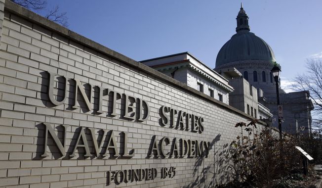 An entrance to the U.S. Naval Academy campus in Annapolis, Md., is seen on Jan. 9, 2014. Reported sexual assaults at the U.S. military academies shot up during the 2021-22 school year, and one in five female students surveyed said they experienced unwanted sexual contact, The Associated Press has learned. (AP Photo/Patrick Semansky, File)