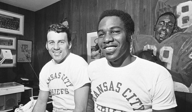 Kansas City Chiefs quarterback Len Dawson, left, and wide receiver Otis Taylor, smile Oct. 26, 1971, in Kansas City, Mo. Otis Taylor, the longtime Kansas City Chiefs wide receiver who formed along with quarterback Len Dawson one of the NFL&#x27;s dynamic duos, died Thursday, March 9, 2023, after more than a decade of health problems. He was 80. (AP Photo/William P. Straeter, FIle)