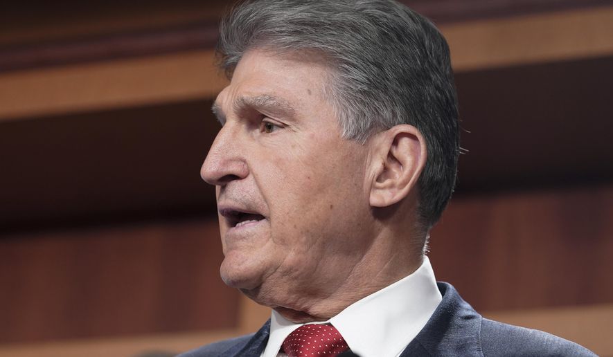 Sen. Joe Manchin, D-W.Va., speaks during the news conference to introduce the Restricting the Emergence of Security Threats that Risk Information Communications Technology Act, or RESTRICT Act, Tuesday, March 7, 2023, on Capitol Hill in Washington. (AP Photo/Mariam Zuhaib)