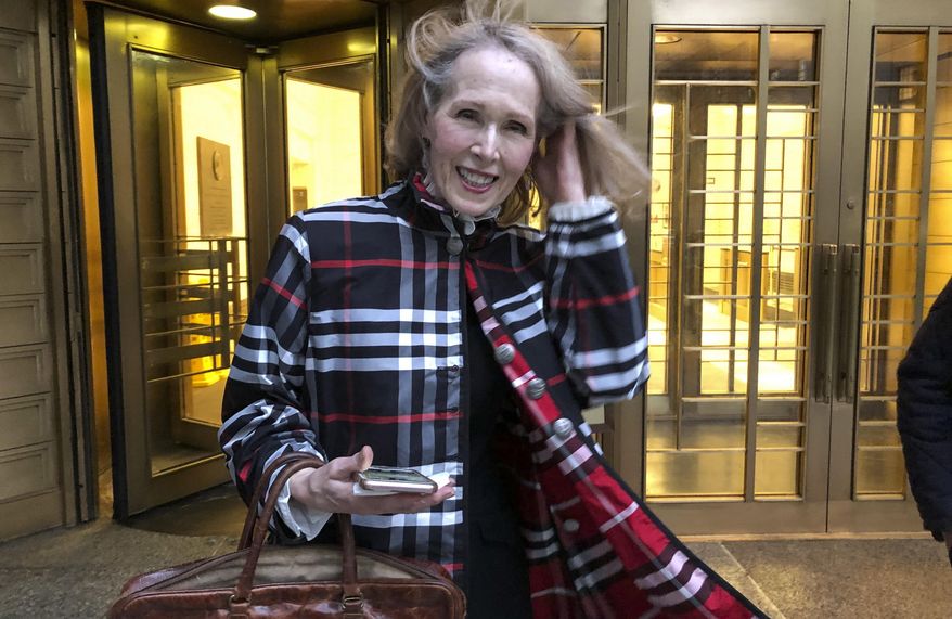 Columnist E. Jean Carroll leaves federal court, on Feb. 22, 2022, in New York. Former President Donald Trump's controversial remarks about women in an “Access Hollywood” tape can be heard at a civil trial resulting from a columnist’s claims that he raped her in the 1990s, a federal judge ruled Friday, March 10, 2023. (AP Photo/Larry Neumeister, File)