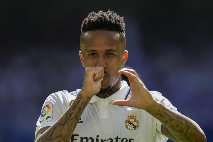 Real Madrid&#x27;s Eder Militao celebrates after he scored his side&#x27;s second goal during a Spanish La Liga soccer match between Real Madrid and Espanyol at the Santiago Bernabeu stadium in Madrid, Spain, Saturday, March 11, 2023. (AP Photo/Bernat Armangue)