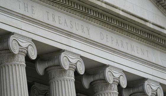 This May 4, 2021, file photo shows the U.S. Treasury Building in Washington. (AP Photo/Patrick Semansky, File)