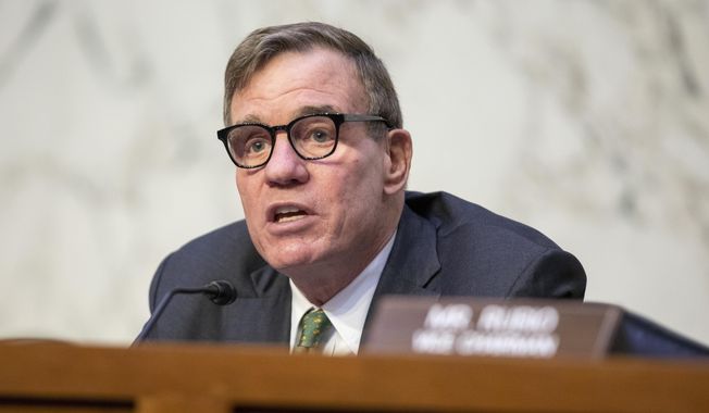 Chairman Mark Warner, D-Va., speaks during a Senate Intelligence Committee hearing to examine worldwide threats at the Capitol in Washington, Wednesday, March 8, 2023. (AP Photo/Amanda Andrade-Rhoades) **FILE**