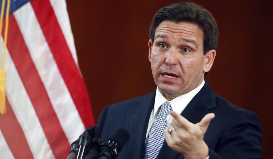 Florida Gov. Ron DeSantis answers questions from the media in the Florida Cabinet following his State of the State address during a joint session of the Senate and House of Representatives Tuesday, March 7, 2023, at the Capitol in Tallahassee, Fla. Advocates for open government are ringing alarms about plans by Florida Gov. Ron DeSantis&#x27; administration that could make it harder to learn what public officials are doing and to speak out against them. (AP Photo/Phil Sears, File)