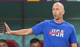 United States head coach Gregg Berhalter gestures during the World Cup round of 16 soccer match against the Netherlands at Khalifa International Stadium in Doha, Qatar, Dec. 3, 2022. United States women’s coach Vlatko Andonovski earned 27% as much as men’s coach Berhalter in the year ending last March 31, down slightly from 28% in the previous year. (AP Photo/Ebrahim Noroozi, File) **FILE**