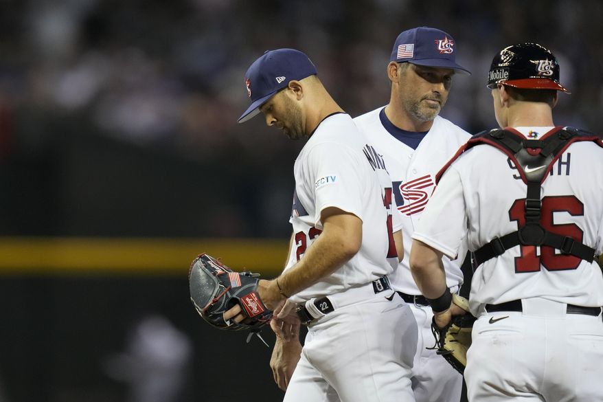 United States pitcher Nick Martinez, left, exits during the third inning of a World Baseball Classic game against Mexico in Phoenix, Sunday, March 12, 2023. (AP Photo/Godofredo A. Vásquez) **FILE**