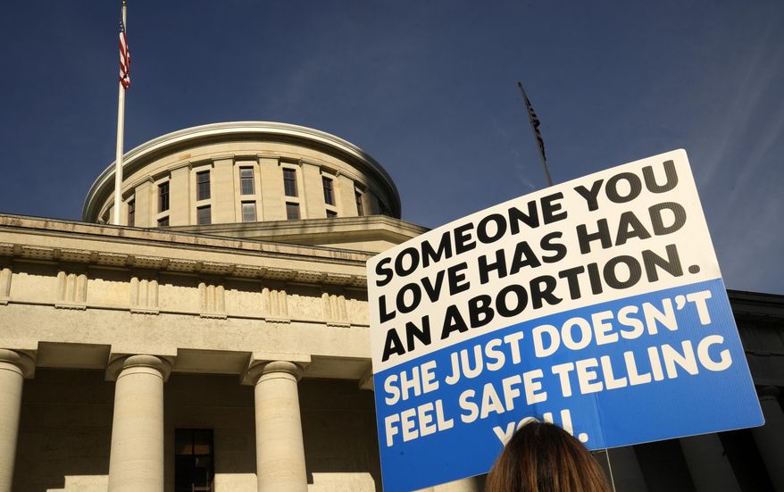 Protesters rally at the Ohio Statehouse in support of abortion after the Supreme Court overturned Roe vs. Wade, June 24, 2022 in Columbus, Ohio. The Ohio Supreme Court agreed Tuesday, March 14, 2023, to review a county judge’s order that is blocking enforcement of the state's near-ban on abortions, and to consider whether the clinics challenging the law have legal standing to do so. In its split decision, the court, however, denied Republican Attorney General Dave Yost's request to launch its own review of the right to an abortion under the Ohio Constitution, leaving those arguments to play out in lower court. (Barbara J. Perenic/The Columbus Dispatch via AP, File0