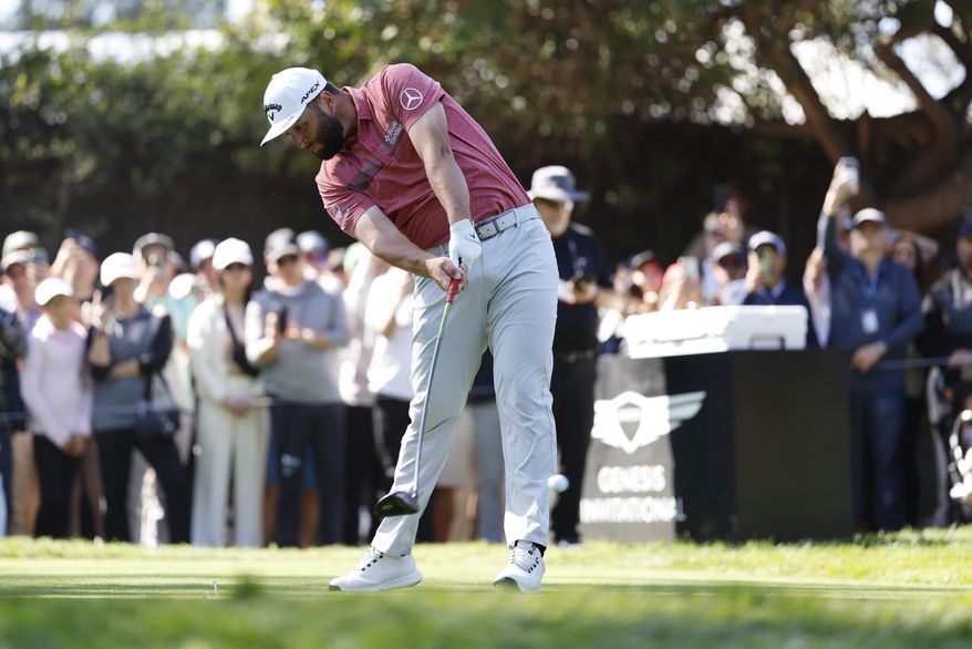 Jon Rahm hits from the 11th tee during the final round of the Genesis Invitational golf tournament at Riviera Country Club, Sunday, Feb. 19, 2023, in the Pacific Palisades area of Los Angeles. (AP Photo/Ryan Kang) **FILE**