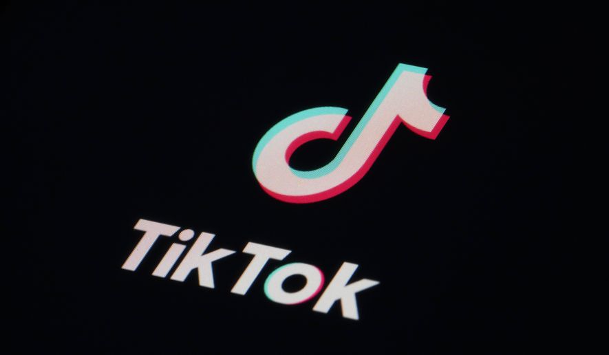 The icon for the video sharing TikTok app is seen on a smartphone, Tuesday, Feb. 28, 2023, in Marple Township, Pa. TikTok was dismissive Wednesday, March 15, of reports that the Biden administration was calling for its Chinese owners to sell their stakes in the popular video-sharing app, saying such a move wouldn&#x27;t help protect national security. (AP Photo/Matt Slocum, File)