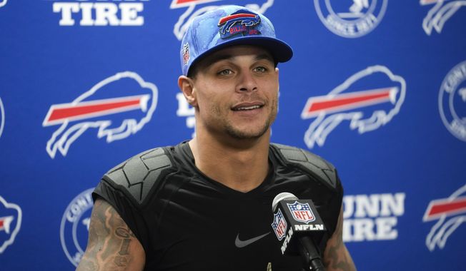 Buffalo Bills safety Jordan Poyer speaks after an NFL football game against the Cleveland Browns in Detroit, Sunday, Nov. 20, 2022. Poyer has elected to stay put by reaching a two-year agreement to re-sign with the Buffalo Bills after briefly testing free agency, a person familiar with the deal confirmed to The Associated Press Wednesday, March 15, 2023. (AP Photo/Paul Sancya, File)