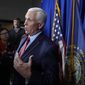 Former Vice President Mike Pence faces reporters after making remarks at a GOP fundraising dinner, Thursday, March 16, 2023, in Keene, N.H. (AP Photo/Steven Senne)