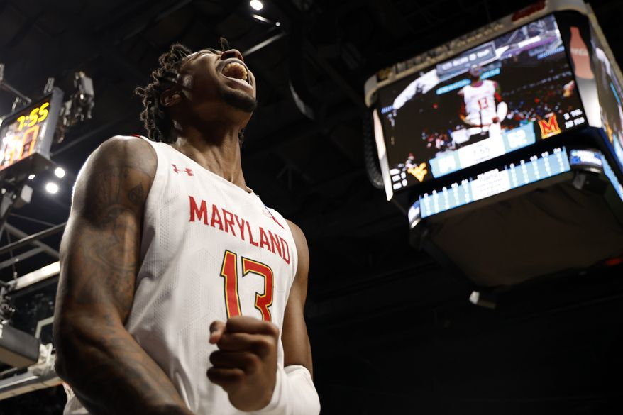 Maryland guard Hakim Hart (13) reacts after a basket in the second half of a first-round college basketball game against West Virginia in the NCAA Tournament in Birmingham, Ala., Thursday, March 16, 2023. Maryland won 67-65. (AP Photo/Butch Dill)