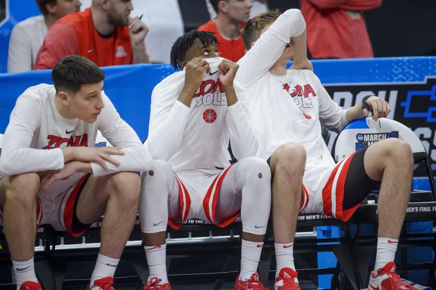 Arizona players sit on the bench in the final seconds of a first-round college basketball game against Princeton in the men&#x27;s NCAA Tournament in Sacramento, Calif., Thursday, March 16, 2023. Princeton won 59-55. (AP Photo/Randall Benton)