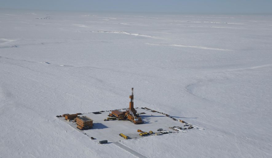 This 2019 aerial photo provided by ConocoPhillips shows an exploratory drilling camp at the proposed site of the Willow oil project on Alaska's North Slope. (ConocoPhillips via AP)