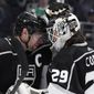 Los Angeles Kings center Anze Kopitar (11) celebrates with goaltender Pheonix Copley (29) after the team&#x27;s 4-1 win over the Columbus Blue Jackets in an NHL hockey game Thursday, March 16, 2023, in Los Angeles. (AP Photo/Marcio Jose Sanchez)