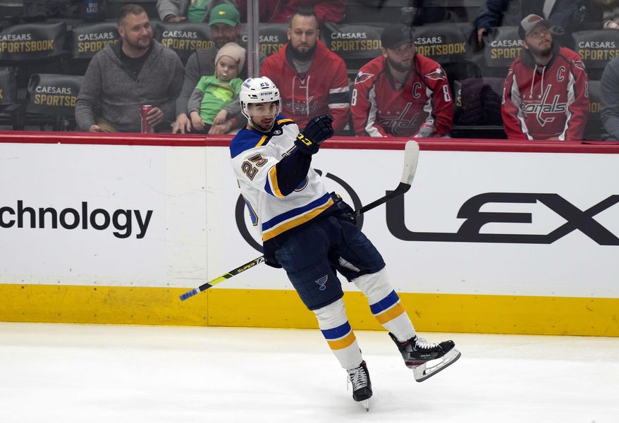 St. Louis Blues center Jordan Kyrou (25) celebrates after scoring a goal during the second period of an NHL hockey game against the Washington Capitals, Friday, March 17, 2023, in Washington. (AP Photo/Carolyn Kaster)