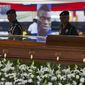A military honour guard stands by the casket containing the remains of Ghana soccer player Christian Atsu during his funeral ceremony at the State House in Accra, Ghana, Friday, March 17, 2023. Atsu, who played for Premier League teams Chelsea and Newcastle, before joining Turkish club Hatayspor last year, was found dead in his collapsed apartment building in the Turkey earthquake. (AP Photo/Misper Apawu)