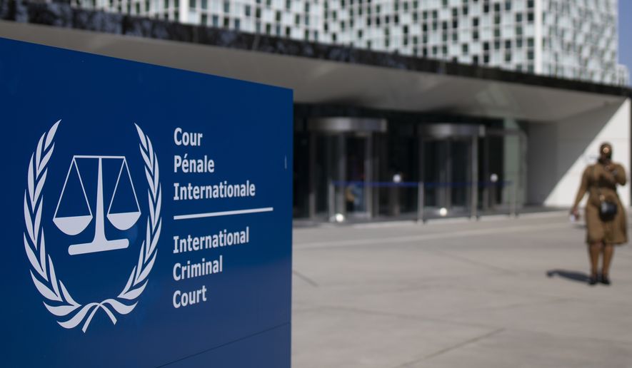 The exterior view of the International Criminal Court are pictured in The Hague, Netherlands, Wednesday, March 31, 2021. The International Criminal Court said Friday, March 17, 2023 it has issued an arrest warrant for Russian President Vladimir Putin for war crimes because of his alleged involvement in abductions of children from Ukraine. (AP Photo/Peter Dejong, File)