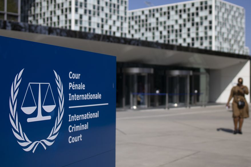 The exterior view of the International Criminal Court are pictured in The Hague, Netherlands, Wednesday, March 31, 2021. The International Criminal Court said Friday, March 17, 2023 it has issued an arrest warrant for Russian President Vladimir Putin for war crimes because of his alleged involvement in abductions of children from Ukraine. (AP Photo/Peter Dejong, File)