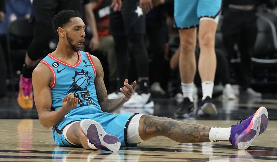 Phoenix Suns guard Cameron Payne (15) reacts after scoring a basket and getting fouled during the first half of an NBA basketball game against the Orlando Magic, Thursday, March 16, 2023, in Phoenix. (AP Photo/Rick Scuteri)