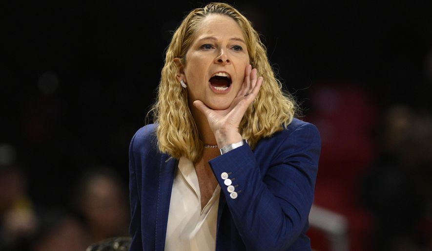 Maryland head coach Brenda Frese yells in the first half of a first-round college basketball game in the NCAA Tournament against Holy Cross, Friday, March 17, 2023, in College Park, Md. (AP Photo/Nick Wass)