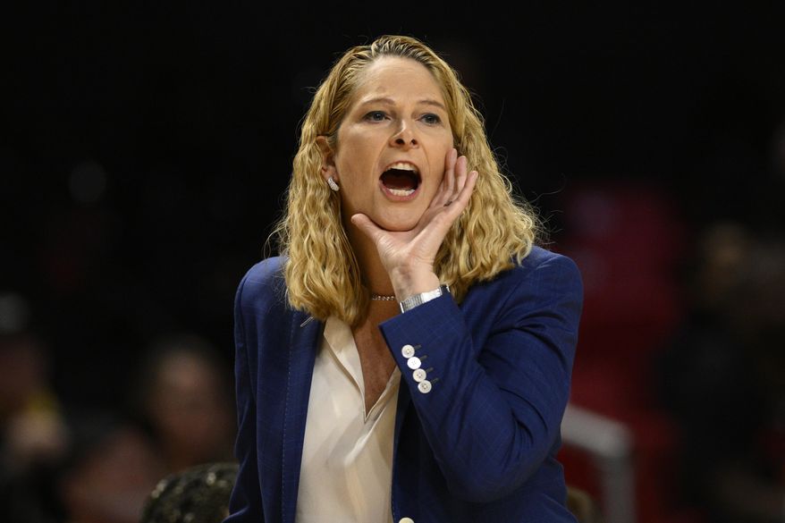 Maryland head coach Brenda Frese yells in the first half of a first-round college basketball game in the NCAA Tournament against Holy Cross, Friday, March 17, 2023, in College Park, Md. (AP Photo/Nick Wass)