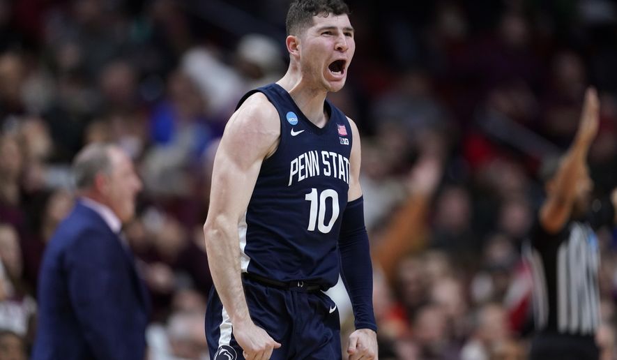 Penn State guard Andrew Funk celebrates after making a 3-point basket in the first half of a first-round college basketball game against Texas A&amp;M in the NCAA Tournament, Thursday, March 16, 2023, in Des Moines, Iowa. (AP Photo/Charlie Neibergall)