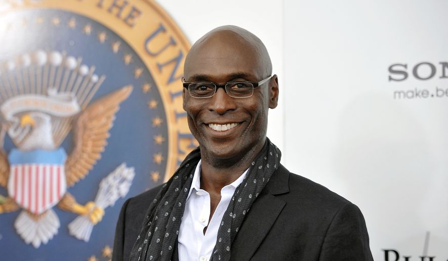 Actor Lance Reddick appears at the &quot;White House Down&quot; premiere in New York on June 25, 2013. Reddick, a character actor who specialized in intense, icy and possibly sinister authority figures on TV and film, including “The Wire,” &quot;Fringe” and the “John Wick” franchise, died suddenly on Friday, March 17, 2023. He was 60. (Photo by Evan Agostini/Invision/AP) ** FILE **