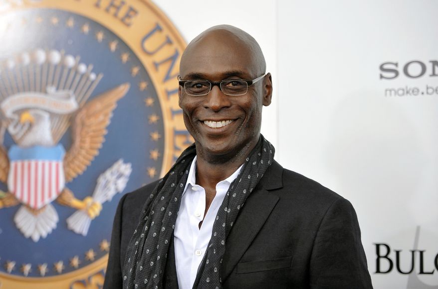Actor Lance Reddick appears at the &quot;White House Down&quot; premiere in New York on June 25, 2013. Reddick, a character actor who specialized in intense, icy and possibly sinister authority figures on TV and film, including “The Wire,” &quot;Fringe” and the “John Wick” franchise, died suddenly on Friday, March 17, 2023. He was 60. (Photo by Evan Agostini/Invision/AP) ** FILE **