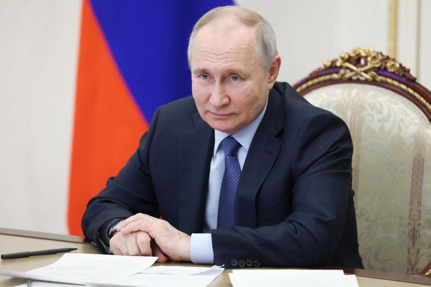 Russian President Vladimir Putin chairs a meeting on the social and economic development of Crimea and Sevastopol via a videoconference at the Moscow&#x27;s Kremlin in Moscow, Russia, Friday, March 17, 2023. (Sputnik, Kremlin Pool Photo via AP)