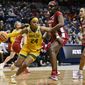 Baylor&#x27;s Sarah Andrews (24) dribbles around Alabama&#x27;s Jada Rice (31) in the first half of a first-round college basketball game in the NCAA Tournament, Saturday, March 18, 2023, in Storrs, Conn. (AP Photo/Jessica Hill)