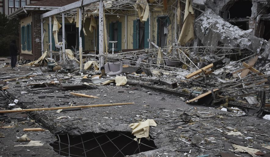 A damaged restaurant is seen after Russian shelling hit in Zaporizhzhia, Ukraine, Saturday, March 18, 2023. (AP Photo/Andriy Andriyenko)