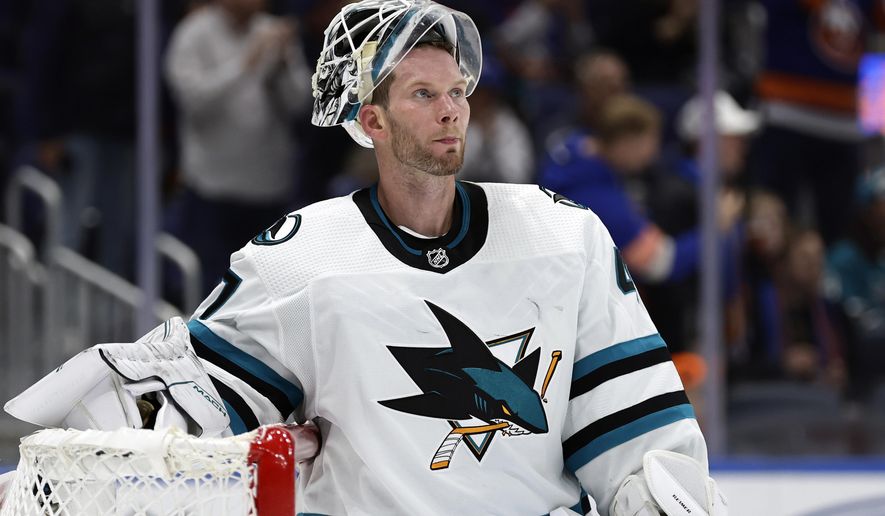 FILE - San Jose Sharks goaltender James Reimer (47) reacts after giving up a goal against the New York Islanders in the second period of an NHL hockey game Tuesday, Oct. 18, 2022, in Elmont, N.Y. Reimer won&#x27;t take part in pregame warmups, saying the team&#x27;s decision to wear Pride-themed jerseys in support of the LGBTQIA+ community runs counter to his religious beliefs. (AP Photo/Adam Hunger, File)