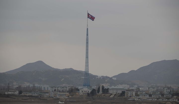 A North Korean flag flutters in North Korea&#x27;s village Gijungdong as seen from an South Korea&#x27;s observation post inside the demilitarized zone in Paju, South Korea during a media tour, March 3, 2023. The United States, its Western allies and experts shone a spotlight on the dire human rights situation and increasing repression in North Korea at a U.N. meeting Friday, March17, 2023 that China and Russia denounced as a politicized move likely to escalate tensions on the Korean peninsula. (Jeon Heon-Kyun/Pool Photo via AP, File)