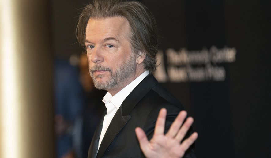David Spade arrives on the red carpet for the 24th Annual Mark Twain Prize for American Humor at the Kennedy Center for the Performing Arts on Sunday, March 19, 2023, in Washington. (AP Photo/Kevin Wolf)