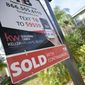 A real estate sign is posted outside of a recently sold home, Tuesday, Feb. 21, 2023, in Valrico, Fla. (AP Photo/Phelan M. Ebenhack) ** FILE **