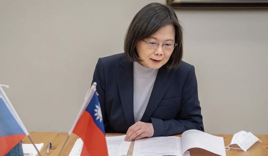 In this photo released by the Taiwan Presidential Office, Taiwan&#x27;s President Tsai Ing-wen speaks by phone with the Czech Republic&#x27;s President elect Petr Pavel in Taipei, Taiwan, Jan. 30, 2023. The Biden administration has been stressing to Beijing that an expected unofficial visit to the United States by Taiwan President Tsai Ing-wen should not be used as pretext by Beijing to step up aggressive activity in the Taiwan Strait. (Taiwan Presidential Office via AP)