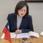 In this photo released by the Taiwan Presidential Office, Taiwan&#x27;s President Tsai Ing-wen speaks by phone with the Czech Republic&#x27;s President elect Petr Pavel in Taipei, Taiwan, Jan. 30, 2023. The Biden administration has been stressing to Beijing that an expected unofficial visit to the United States by Taiwan President Tsai Ing-wen should not be used as pretext by Beijing to step up aggressive activity in the Taiwan Strait. (Taiwan Presidential Office via AP)