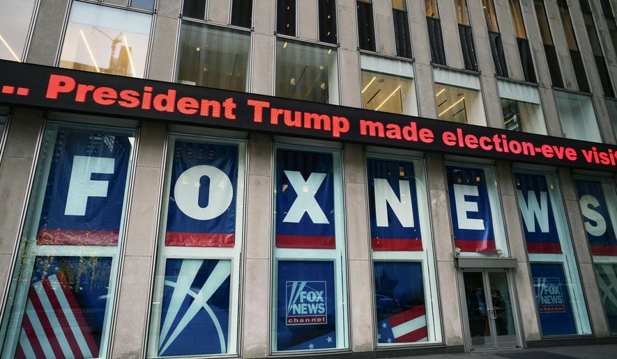 A headline about President Donald Trump is displayed outside Fox News studios in New York on Nov. 28, 2018. (AP Photo/Mark Lennihan, File)