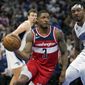 Washington Wizards&#x27; Bradley Beal (3) makes a move to get around Orlando Magic&#x27;s Wendell Carter Jr. (34) during the second half of an NBA basketball game, Tuesday, March 21, 2023, in Orlando, Fla. (AP Photo/John Raoux) **FILE**
