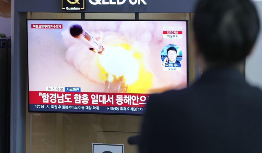 People watches a TV screen reporting North Korea&#x27;s missile launch with file image during a news program at the Seoul Railway Station in Seoul, South Korea, Wednesday, March 22, 2023. North Korea launched multiple cruise missiles toward the sea on Wednesday, South Korea&#x27;s military said, three days after the North carried out what it called a simulated nuclear attack on South Korea. The letters read &quot;North, launched multiple cruise missiles.&quot; (AP Photo/Lee Jin-man)